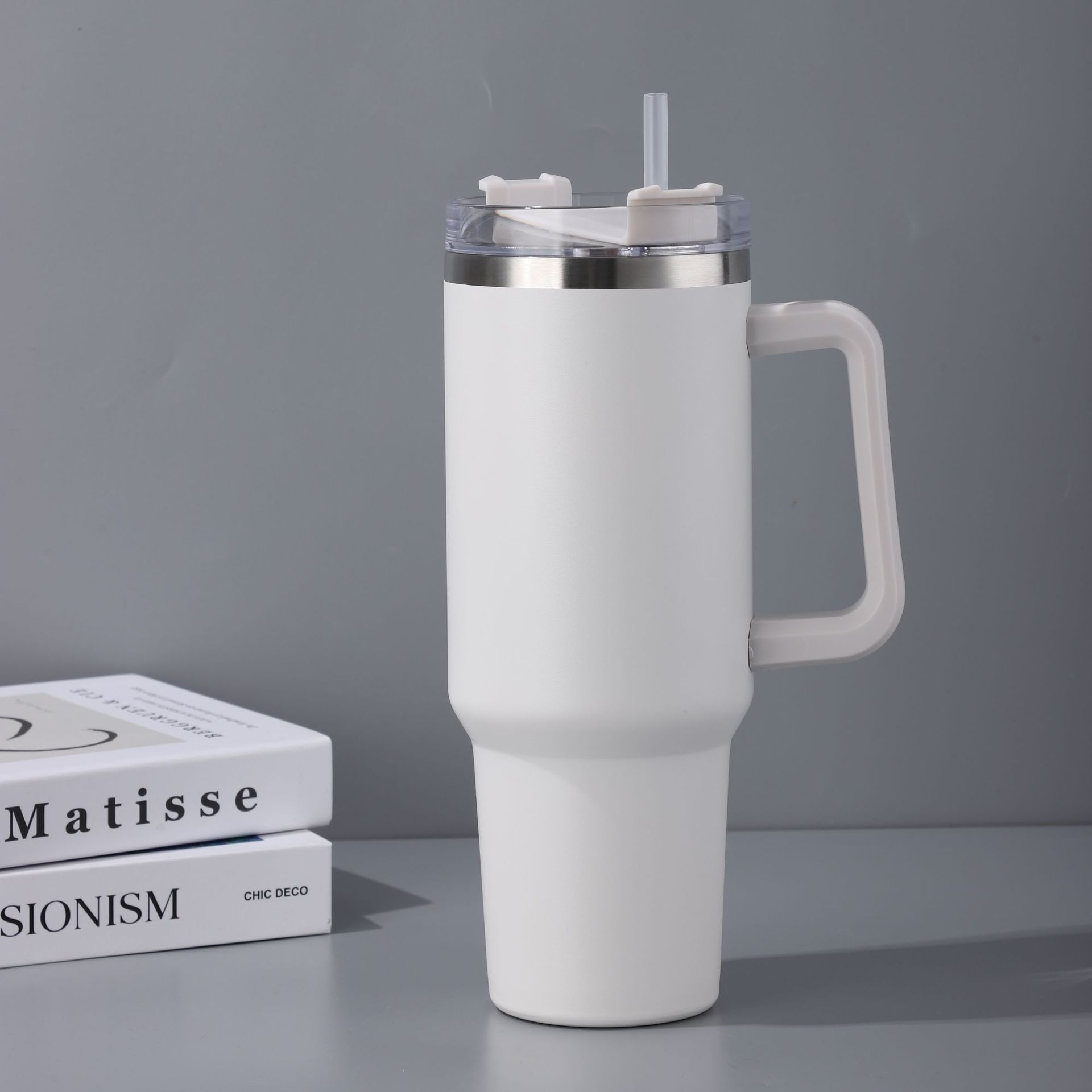 Stainless steel water bottle with straw